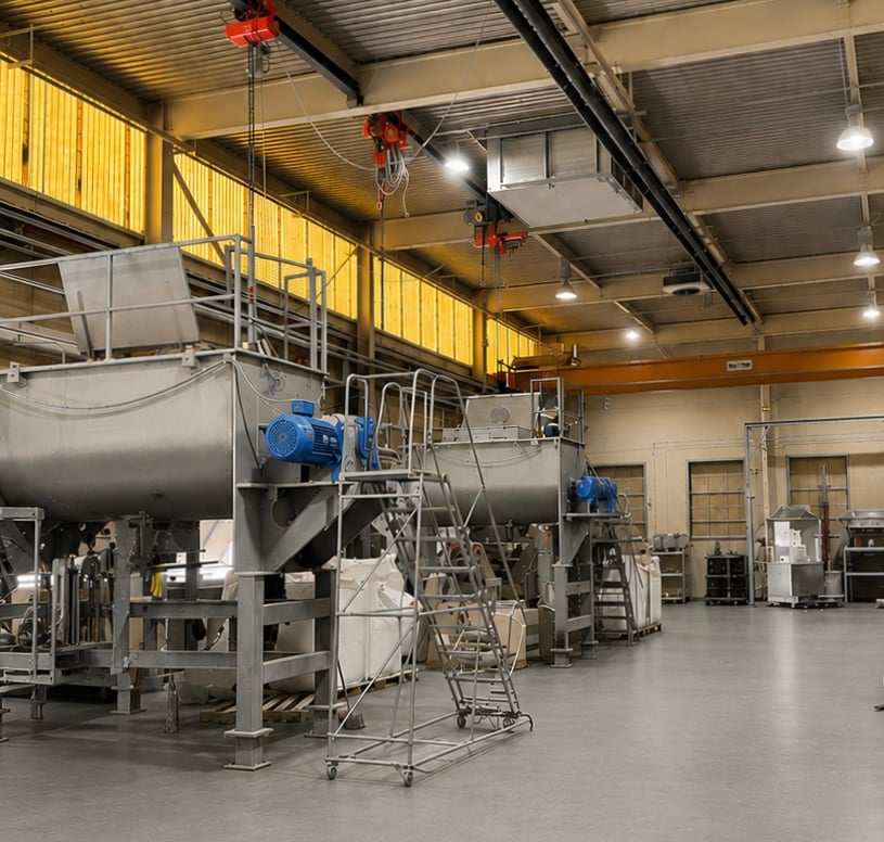 Twin industrial ribbon blenders on the production floor